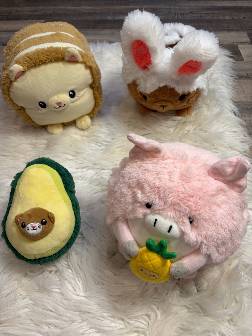 Squishable 4 plush: Loaf Cat, AvoCATo, Pig with Pineapple, Cinnamon Roll Bunny